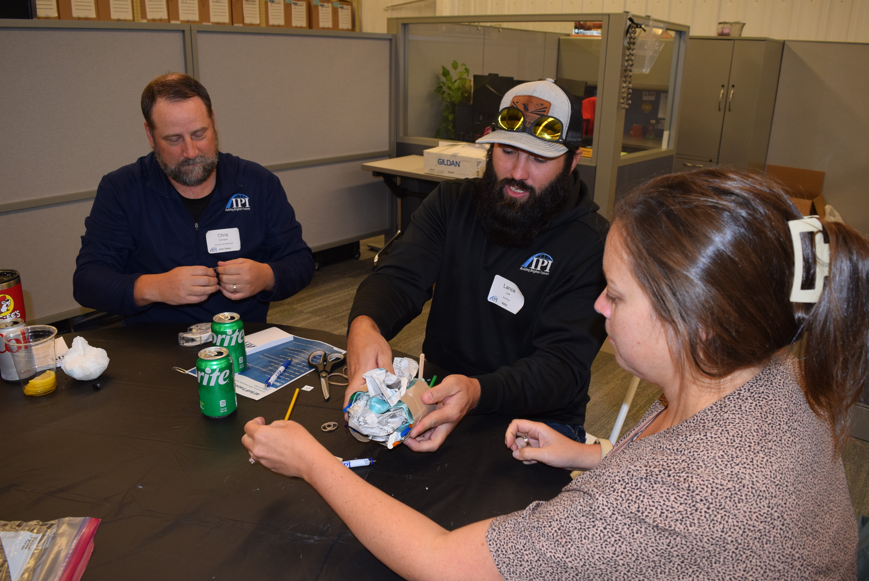 Image of team constructing egg drop package